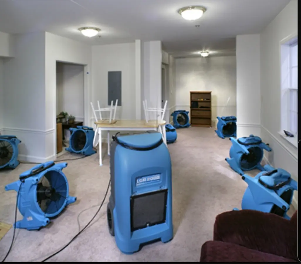 Air movers and dehumidifier setup for Water Damage Restoration in Marathon