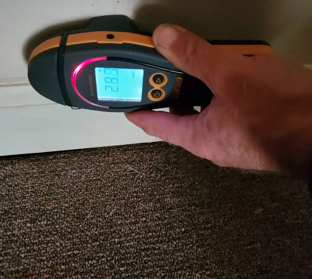 Moisture detection at baseboard during Burst Pipe Cleanup in Marathon